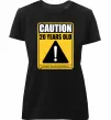 Женская премиум футболка Caution 20 years old Черный фото