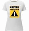 Женская премиум футболка Caution 40 years old Белый фото