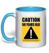 Чашка з кольоровою ручкою Caution 50 years old Блакитний фото