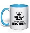Чашка з кольоровою ручкою Keep calm i have the coolest brother Блакитний фото