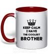 Чашка с цветной ручкой Keep calm i have the coolest brother Красный фото