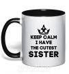 Чашка з кольоровою ручкою Keep calm i have the cutest sister Чорний фото
